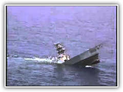 A Retired Navy Ship Sinks After Being Hit